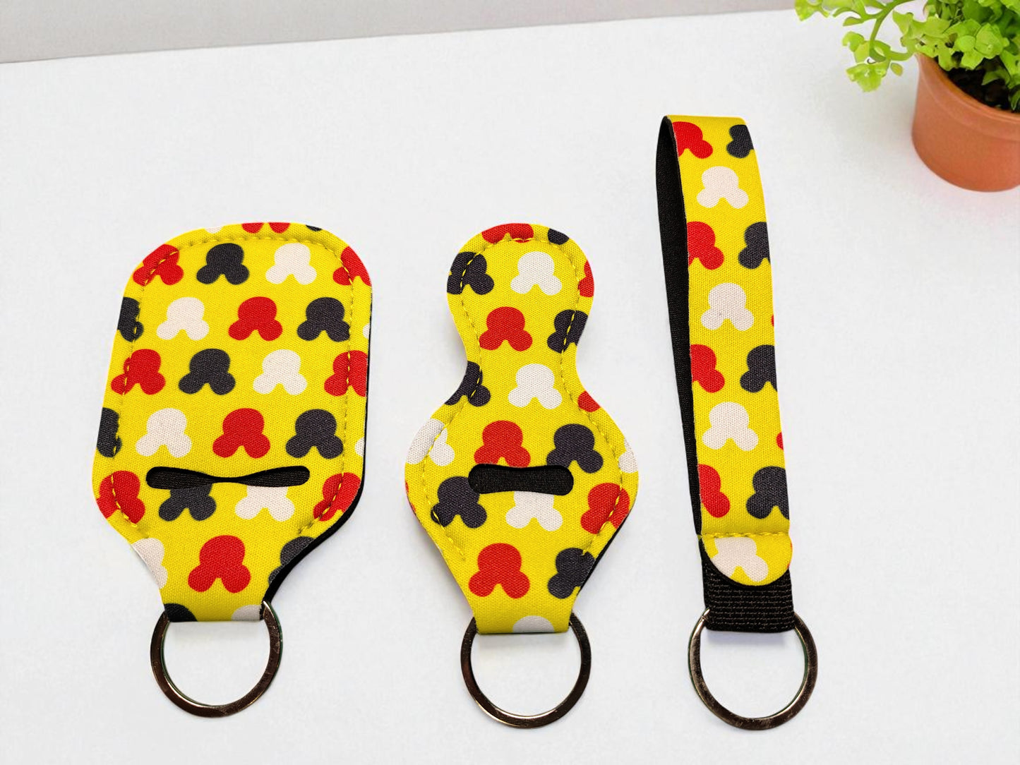 4 Piece Keychain Set with Pompom - Assorted Designs Wholesale
