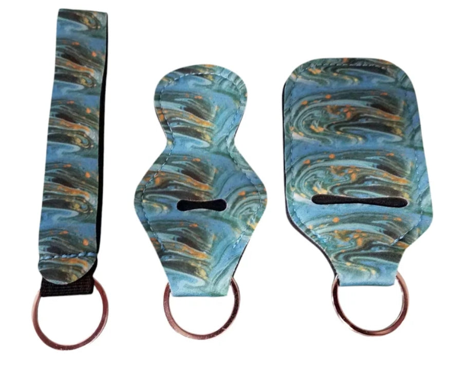 4 Piece Keychain Set with Pompom - Assorted Designs Wholesale