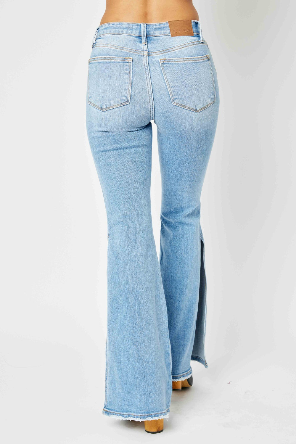 Judy Blue  Wholesale Full Size Mid Rise Raw Hem Slit Flare Jeans